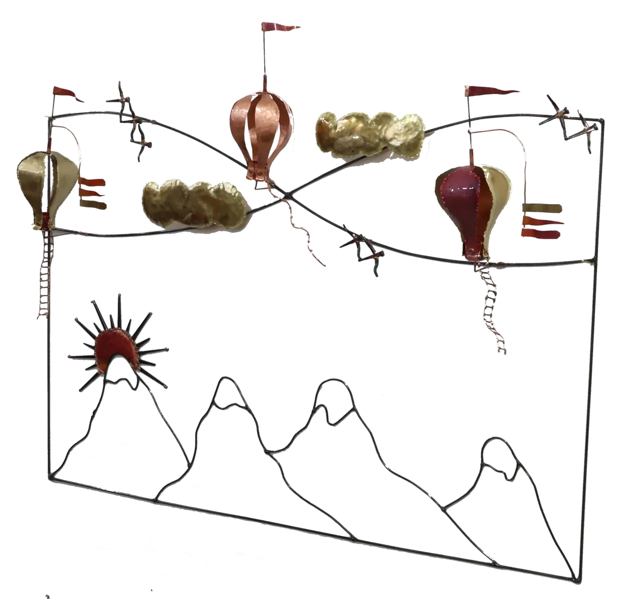 Wall mounted metal art depicting three copper and brass hot air balloons with flags, floating above stylized brass clouds and snow-capped steel mountains, with a copper sun rising over the peaks.