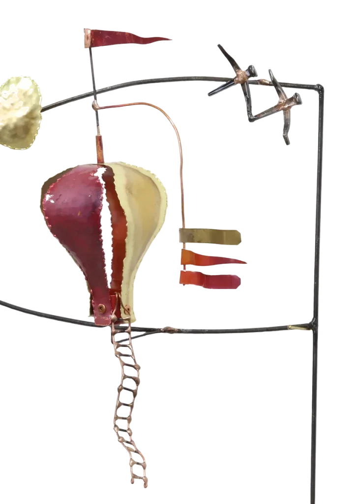 Wall mounted metal art depicting three copper and brass hot air balloons with flags, floating above stylized brass clouds and snow-capped steel mountains, with a copper sun rising over the peaks.