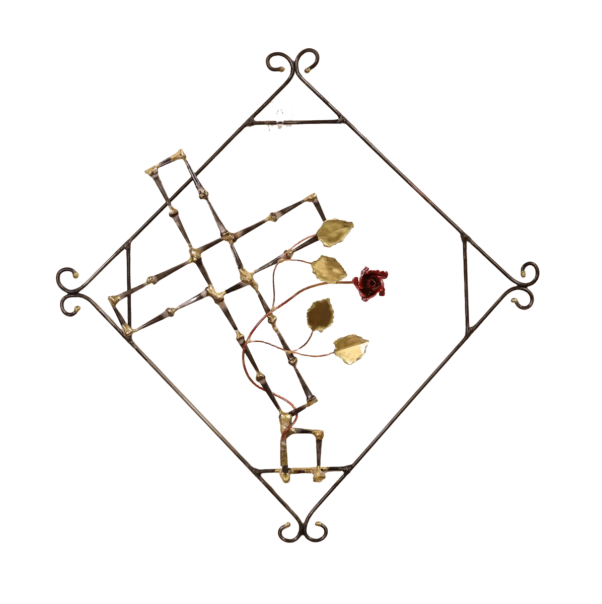 Handmade metal wall art depicting a broken cross made of steel cut nails with a copper rose and vine with brass leaves, growing out of the break in the cross. The broken cross is framed in a steel diamond shape with decorative curls. The broken cross and rose are symbolic of the resurrection of Jesus after crucifixion.